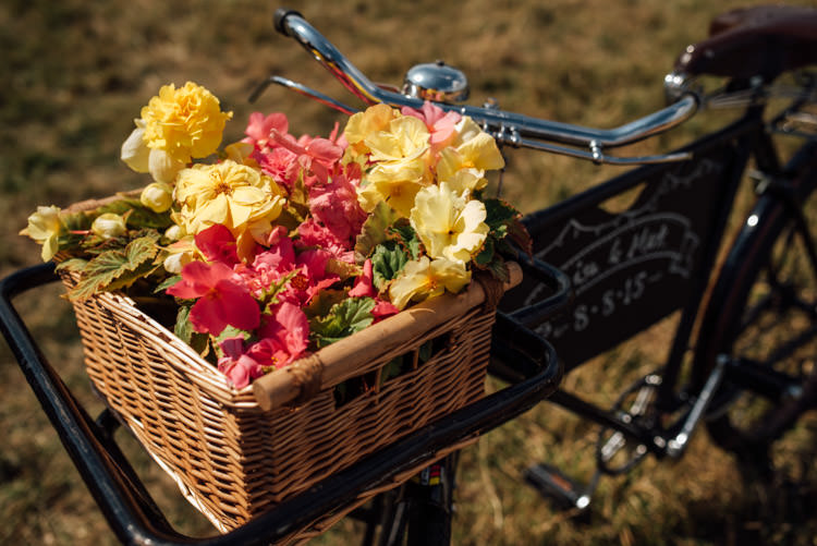 Bicycle Basket Flowers Quirky Rustic Hand Made Tipi Wedding http://www.mattbrownphotography.co.uk/