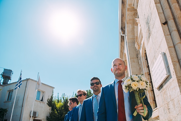 Groom Royal Blue Coat Red Tie Groomsmen Bouquet Beautiful Traditional Greek Destination Wedding in Cyprus http://www.jonnybarratt.com/