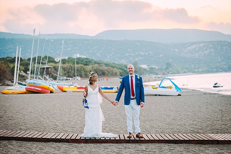 Bride Stella York Lace Gown Badgley Mischka Shoes Groom Royal Blue Coat Red Tie Island Sunset Ocean Beautiful Traditional Greek Destination Wedding in Cyprus http://www.jonnybarratt.com/
