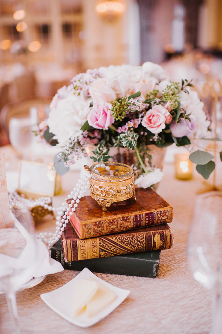 Reception Table Setting Flowers Pearls Vintage Books Candles Opulent Pink Gold Victorian Wedding in Seattle http://www.barrieannephotography.com/
