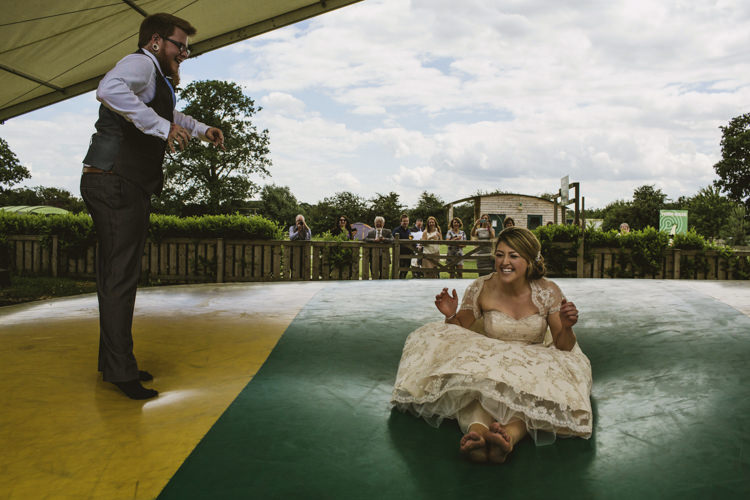 Bouncy Castle Pillow Groom Bride Fun Music Rustic Barn Wedding http://www.yorkplacestudios.co.uk/