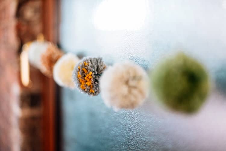 Wool Pom Pom Garland Natural Rustic Yellow Wedding http://www.edbrownphotography.co.uk/