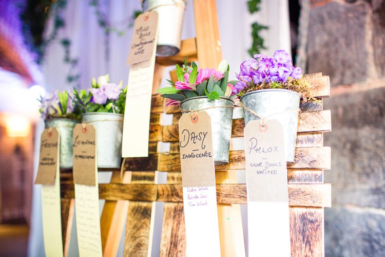 Flower Pot Table Seating Plan Beautiful Cliffside Floral Wedding http://karibellamy.com/