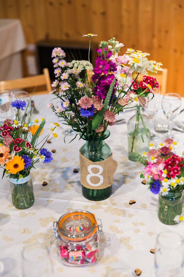 Flowers Centrepiece Bottles Hessian Table Number Relaxed Budget Friendly Village Hall Wedding http://www.lisadawn.co.uk/