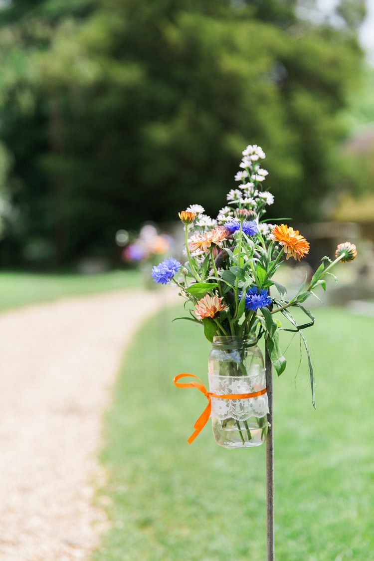 Jar Flowers Hooks Outdoor Relaxed Budget Friendly Village Hall Wedding http://www.lisadawn.co.uk/