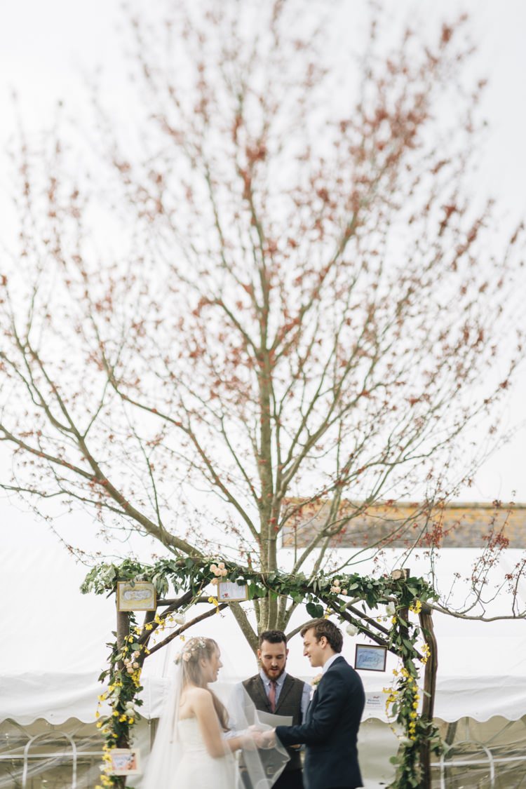 Arch Ceremony Backdrop Arbour Tree Floral Wild Flowers Outdoors Heartfelt DIY Wedding http://www.mattandesther.co.uk/