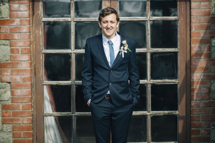 Navy Suit Blue Tie Groom Wild Flowers Outdoors Heartfelt DIY Wedding http://www.mattandesther.co.uk/