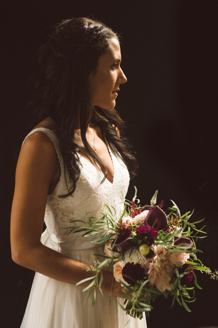 Bride Lace V Neck Bridal Gown Bouquet Cream Maroon Green Flowers Loose Curls Hairstyle Hippy Bohemian Outdoorsy Wedding in Pennsylvania http://tylerboye.com/