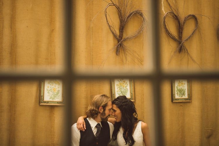 Bride Loose Curls Braid Hairstyle Groom Grey Vest Tie Frames Hay Bows Wall Hippy Bohemian Outdoorsy Wedding in Pennsylvania http://tylerboye.com/