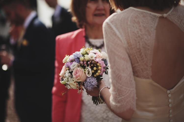 Bouquet Bride Flowers Bridal Pink Purple Roses Free Spirited Beautiful Beach Wedding https://www.paulfullerkentphotography.com/