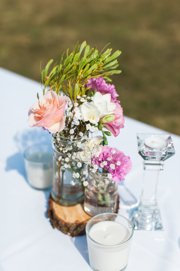 Flowers Log Jars Centrepiece Fresh Pretty Humanist Wedding http://summerlilystudio.com/