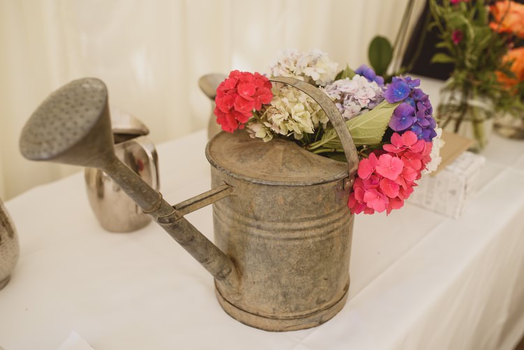Watering Can Flowers Crafty Botanical Natural Wedding http://www.jacksonandcophotography.com/