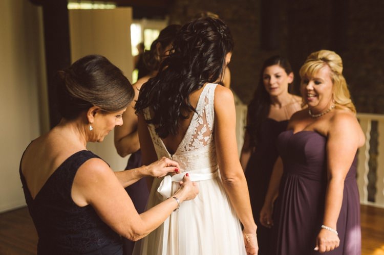 Bride Lace V Neck Bridal Gown Loose Curls Hairstyle Bridesmaids Eggplant Dresses Hippy Bohemian Outdoorsy Wedding in Pennsylvania http://tylerboye.com/