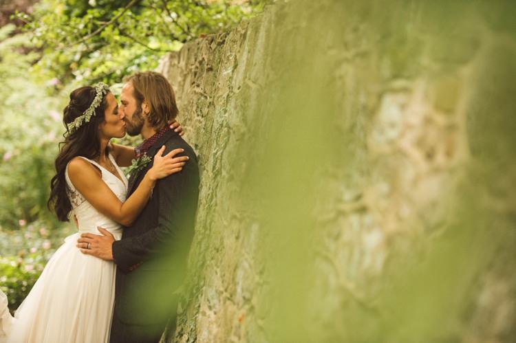 Bride Lace V Neck Bridal Gown Flower Crown Loose Curls Braid Hairstyle Groom Grey Suit Maroon Shirt Button Hole Outdoors Hippy Bohemian Outdoorsy Wedding in Pennsylvania http://tylerboye.com/