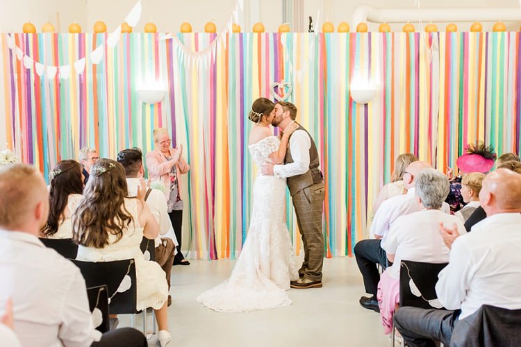 Rainbow Streamer Backdrop Ceremony Multicoloured DIY Rustic Wedding http://vickylamburn.com/