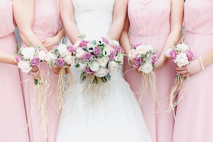 Bouquets Roses Bride Bridesmaids Raffia Outdoorsy Nature Pretty Pink Wedding http://whitestagweddings.com/