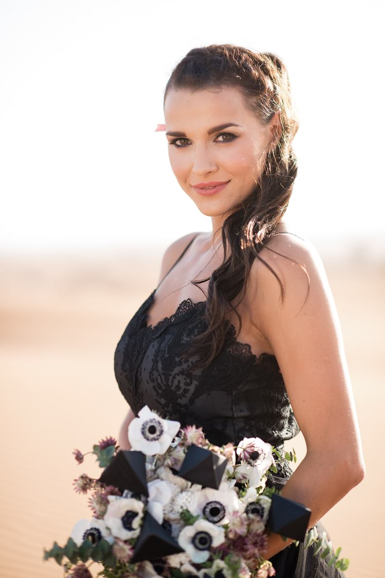 Black Lace Bridal Gown Unusual Bouquet White Anemone Flowers Braid Hairstyle Bride Geometric Desert Dubai Wedding Ideas http://weddingphotographerdubai.me/
