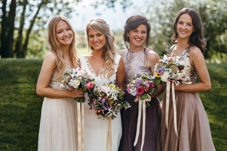 Mismatched Bridesmaids Dresses Ribbon Bouquets Magical Sequins Fairy Lights Barn Wedding http://greenantlersphotography.com/