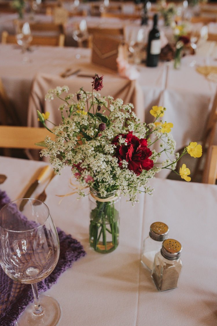Jar Flowers Table Decor Centrepeice Red Yellow Whimsical Bright Village Hall Wedding http://www.beckyryanphotography.co.uk/