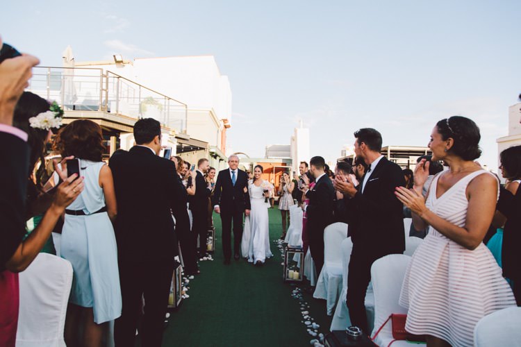 Outdoor Ceremony Bride Entrance Aisle Father Guests Modern Roof Terrace Dusk Wedding Madrid http://www.lorenasanjose.com/