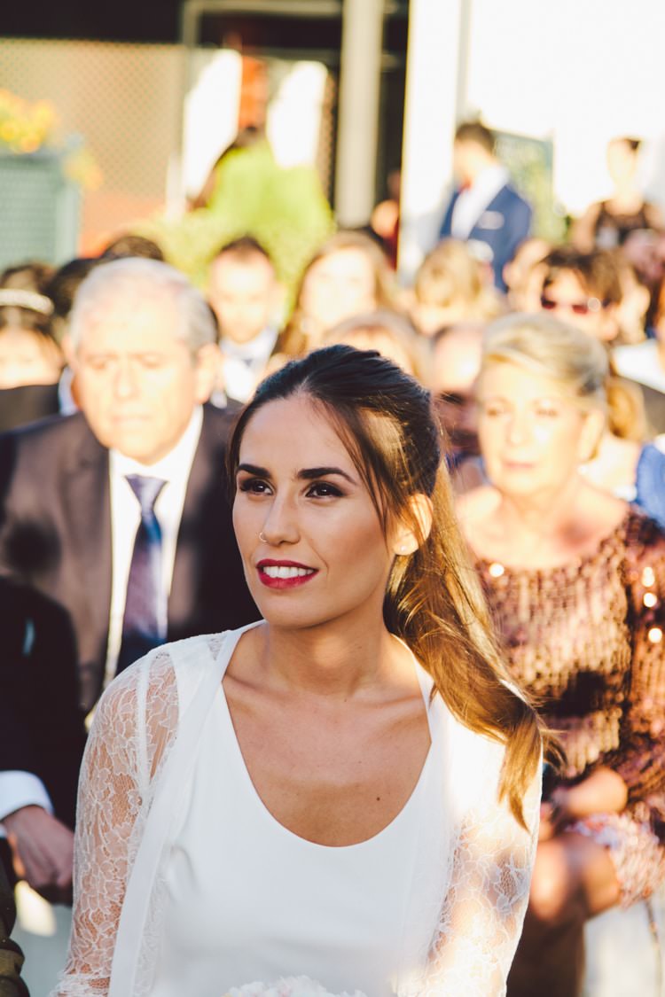 Bride Three Piece Bridal Gown Low Back Lace Ponytail Hairstyle Red Lipstick Guests Modern Roof Terrace Dusk Wedding Madrid http://www.lorenasanjose.com/