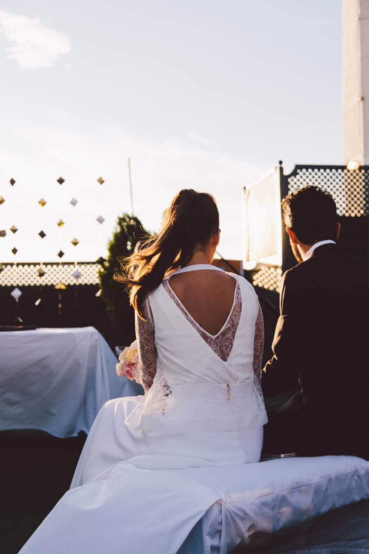 Bride Three Piece Bridal Gown Low Back Lace Groom Sunset Modern Roof Terrace Dusk Wedding Madrid http://www.lorenasanjose.com/