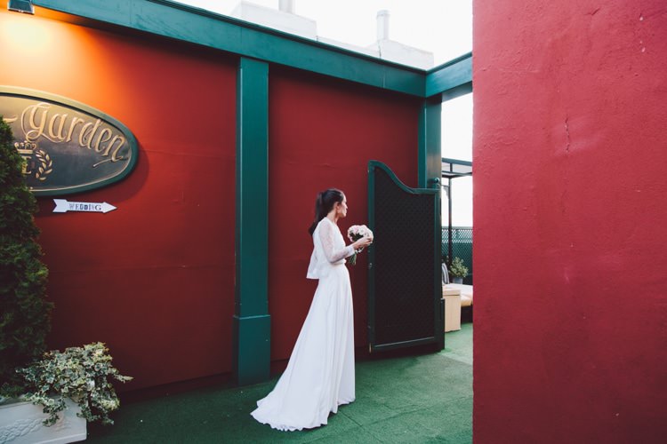 Bride Three Piece Bridal Gown Low Back Lace Bouquet Modern Roof Terrace Dusk Wedding Madrid http://www.lorenasanjose.com/