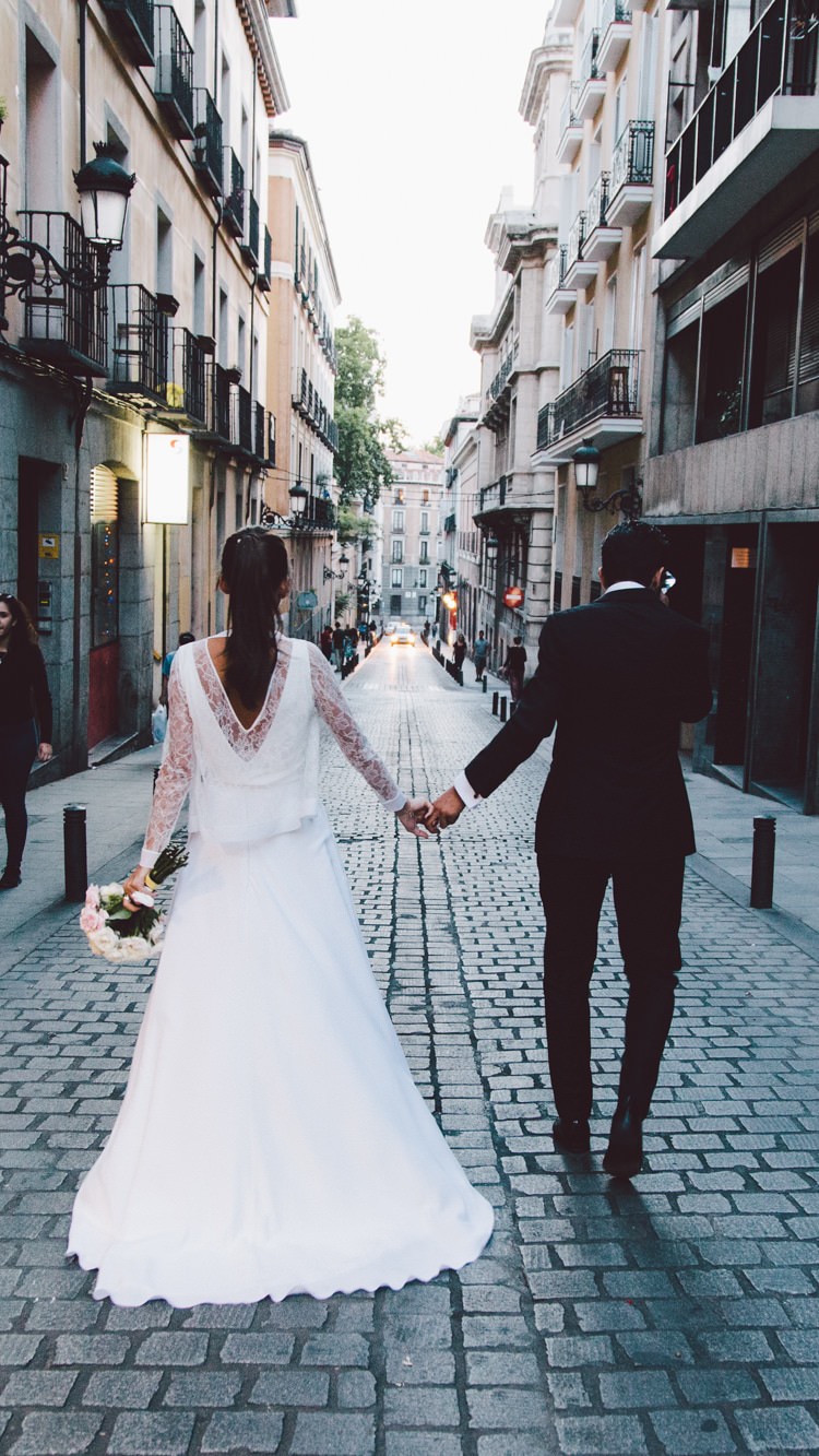Groom Bride Three Piece Bridal Gown Low Back Lace Bouquet City Street Modern Roof Terrace Dusk Wedding Madrid http://www.lorenasanjose.com/