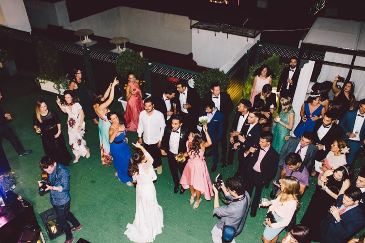 Reception Dancing Guests Celebrations Modern Roof Terrace Dusk Wedding Madrid http://www.lorenasanjose.com/