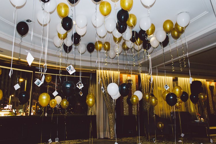 Helium Balloons Polaroid Photos Guests Décor Gold Black White Modern Roof Terrace Dusk Wedding Madrid http://www.lorenasanjose.com/