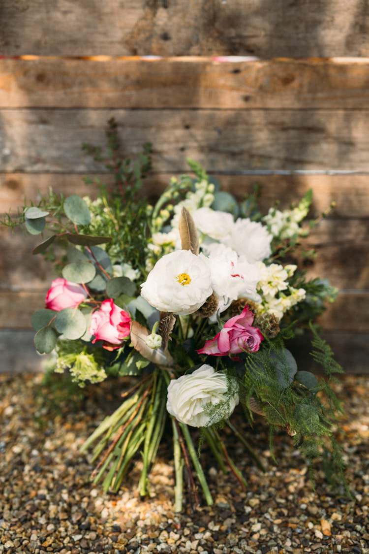 Bouquet Flowers White Rose Pink Foliage Greenery Feather Bride Bridal Boho Blossom Summer Wedding Ideas http://www.catlaneweddings.com/