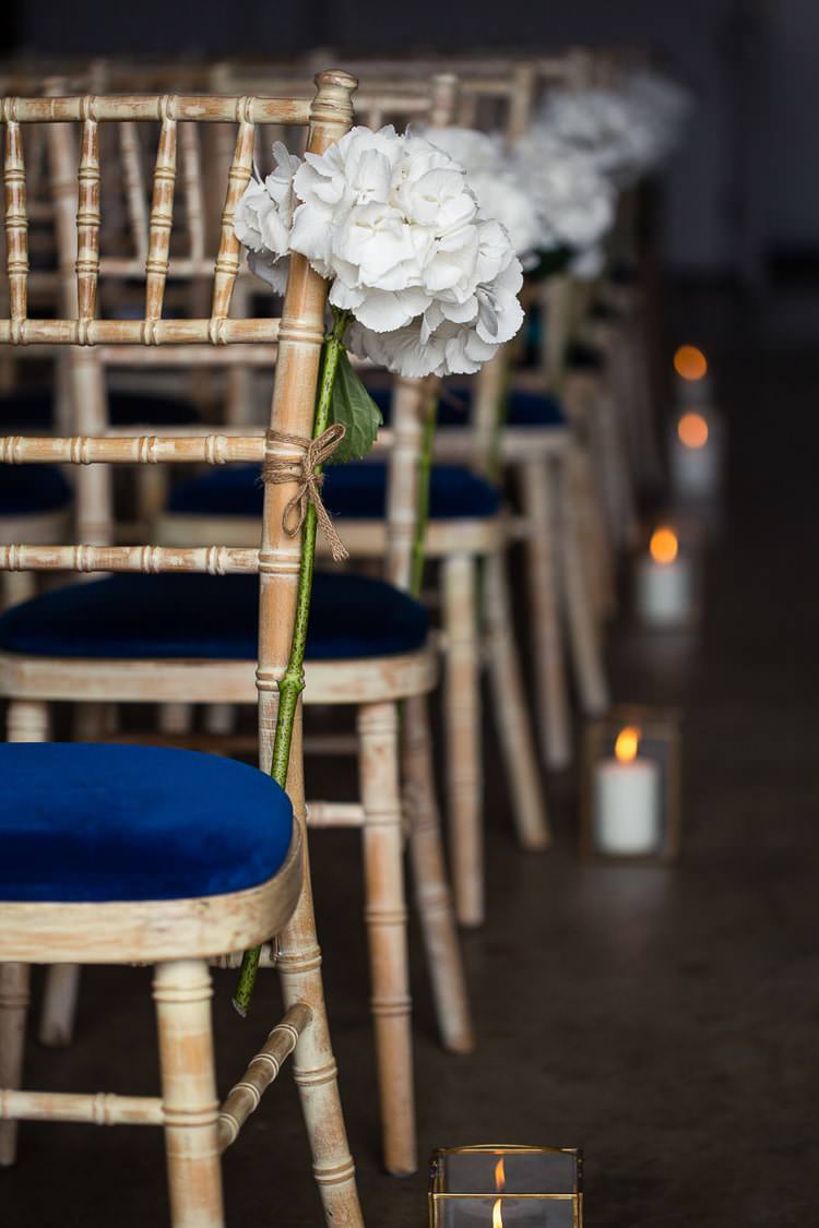 White Hydrangea Flower Pew End Chair Aisle Urban London Stylish Navy White Wedding http://karibellamy.com/