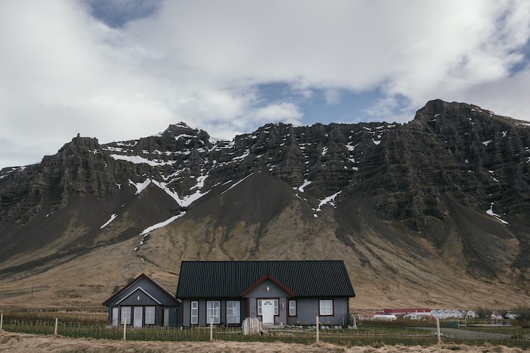 Grey House Mountain Snow Blue Sky Clouds Grass Glacier Lagoon Iceland Anniversary Shoot http://marcsmithphotography.com/