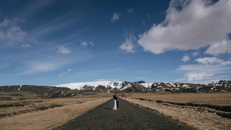 Bride Groom Deserted Road Mountains Snow Blue Sky Clouds Glacier Lagoon Iceland Anniversary Shoot http://marcsmithphotography.com/