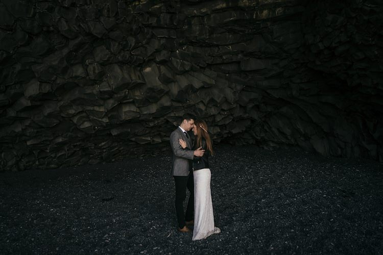 Bride Beaded Stephanie Allin Bridal Gown Leather Jacket Pearl Hair Accessory Groom Grey Tweed Jacket Vest Skinny Jeans Black Sand Rocks Glacier Lagoon Iceland Anniversary Shoot http://marcsmithphotography.com/