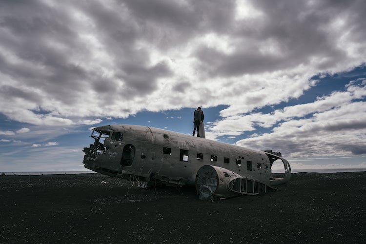 Bride Groom Plane Wreck Blue Sky Clouds Desolate Glacier Lagoon Iceland Anniversary Shoot http://marcsmithphotography.com/