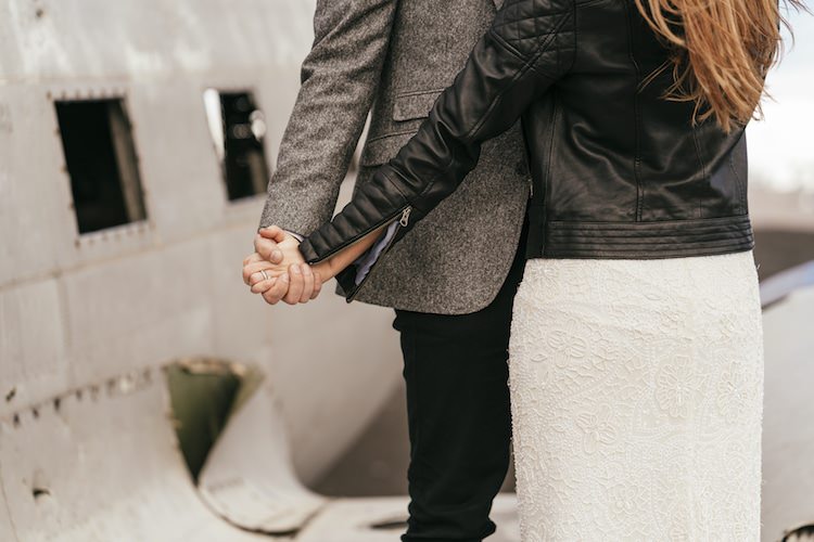 Bride Beaded Stephanie Allin Bridal Gown Leather Jacket Groom Grey Tweed Jacket Skinny Jeans Plane Wreck Glacier Lagoon Iceland Anniversary Shoot http://marcsmithphotography.com/
