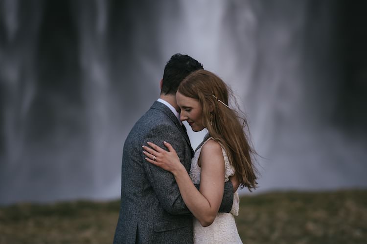 Bride Beaded Stephanie Allin Bridal Gown Pearl Hair Accessory Groom Grey Tweed Jacket Waterfall Glacier Lagoon Iceland Anniversary Shoot http://marcsmithphotography.com/