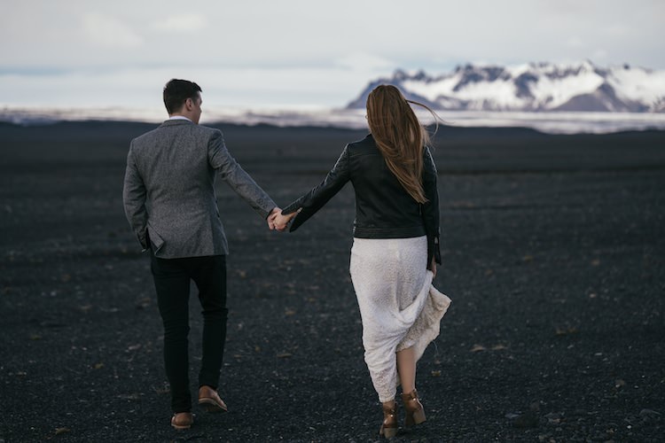 Bride Beaded Stephanie Allin Bridal Gown Leather Jacket Groom Grey Tweed Jacket Skinny Jeans Black Sand Mountain Snow Glacier Lagoon Iceland Anniversary Shoot http://marcsmithphotography.com/