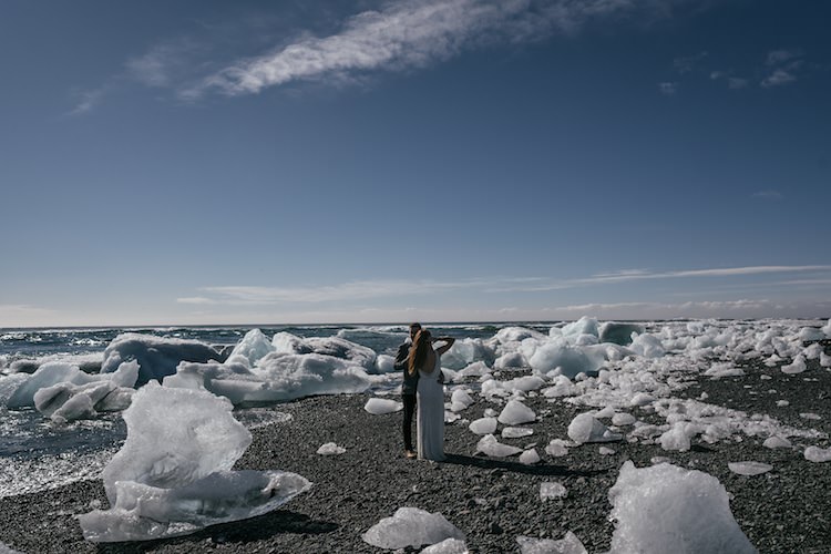 Bride Beaded Low Back Stephanie Allin Bridal Gown Groom Grey Tweed Jacket Ice Blue Sky Cold Glacier Lagoon Iceland Anniversary Shoot http://marcsmithphotography.com/