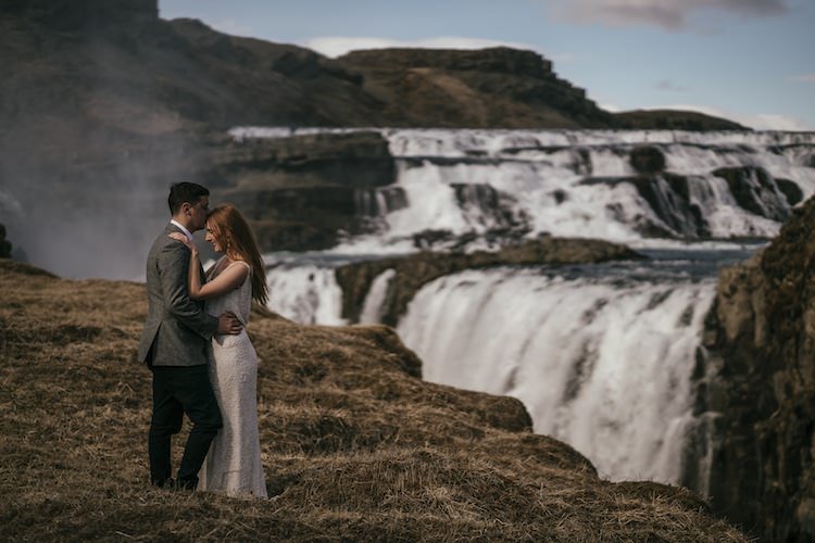 Outdoor Vow Renewal Bride Beaded Stephanie Allin Bridal Gown Groom Grey Tweed Jacket Skinny Jeans Waterfalls Landscape Glacier Lagoon Iceland Anniversary Shoot http://marcsmithphotography.com/