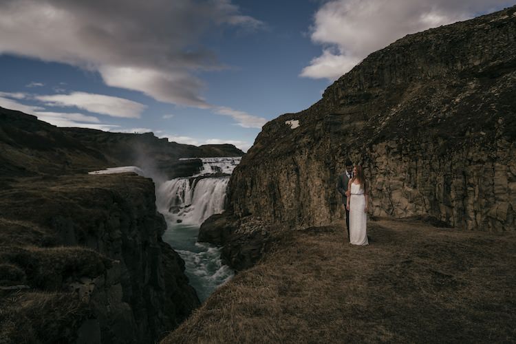 Bride Groom Mountains Waterfalls Blue Sky Clouds Landscape Glacier Lagoon Iceland Anniversary Shoot http://marcsmithphotography.com/