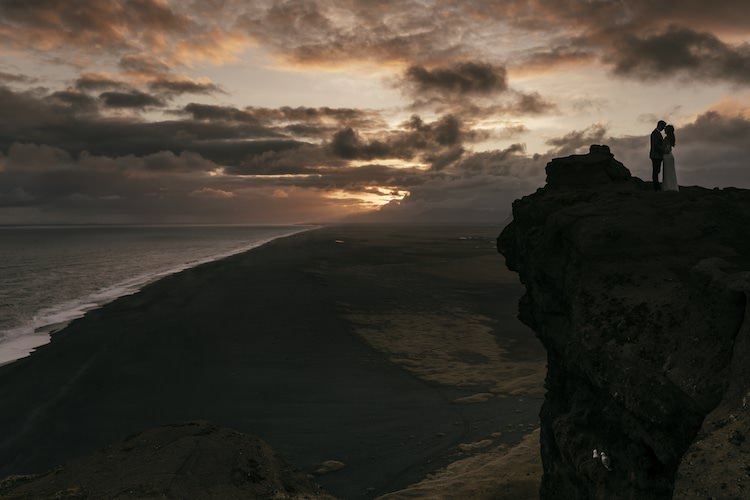Bride Groom Sunset Cliff Ocean Scenery Glacier Lagoon Iceland Anniversary Shoot http://marcsmithphotography.com/