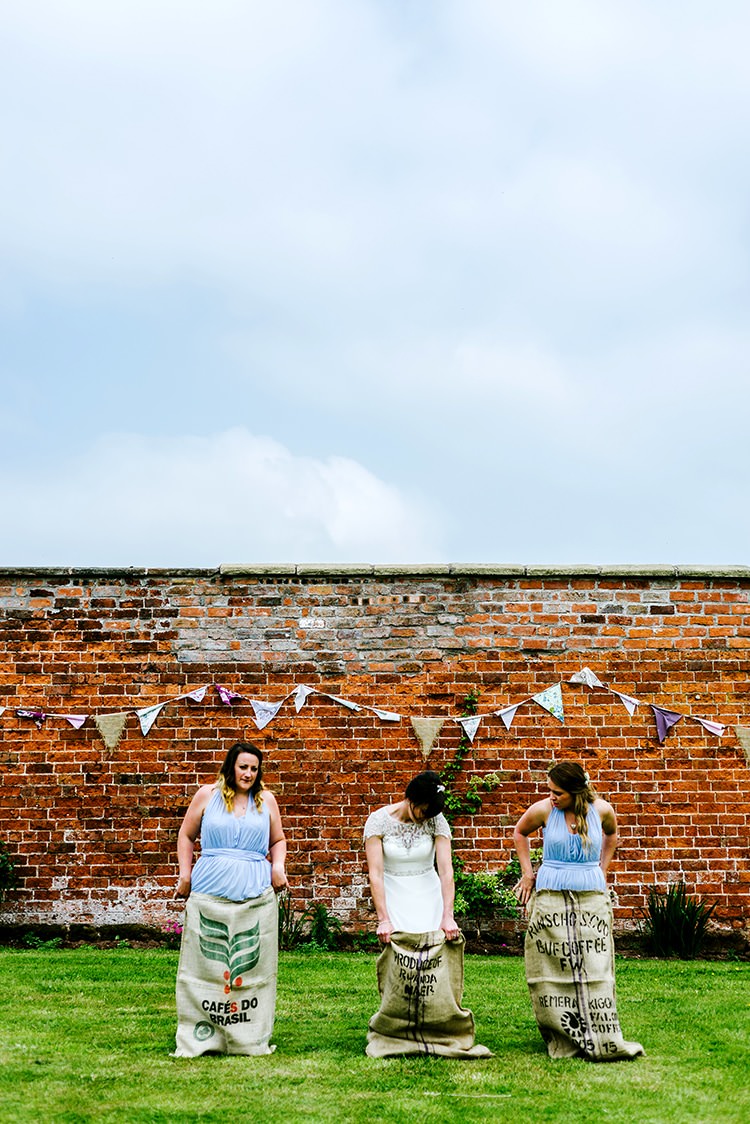 Sack Race Bridesmaids Game Bride Rustic Relaxed Country Garden Wedding http://www.dmcclane.com/