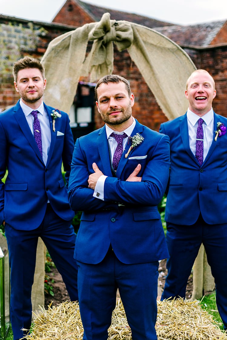 Groom Groomsmen Blue Suit Burton Purple Tie Rustic Relaxed Country Garden Wedding http://www.dmcclane.com/