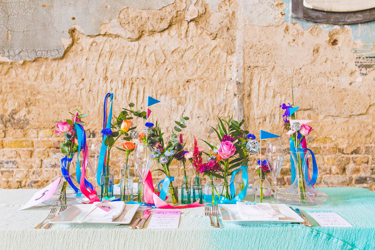 Flowers Bottles Flags Ribbon Centrepiece Watercolour Decor Colourful Alternative Same Sex Wedding Ideas http://www.els-photography.com/