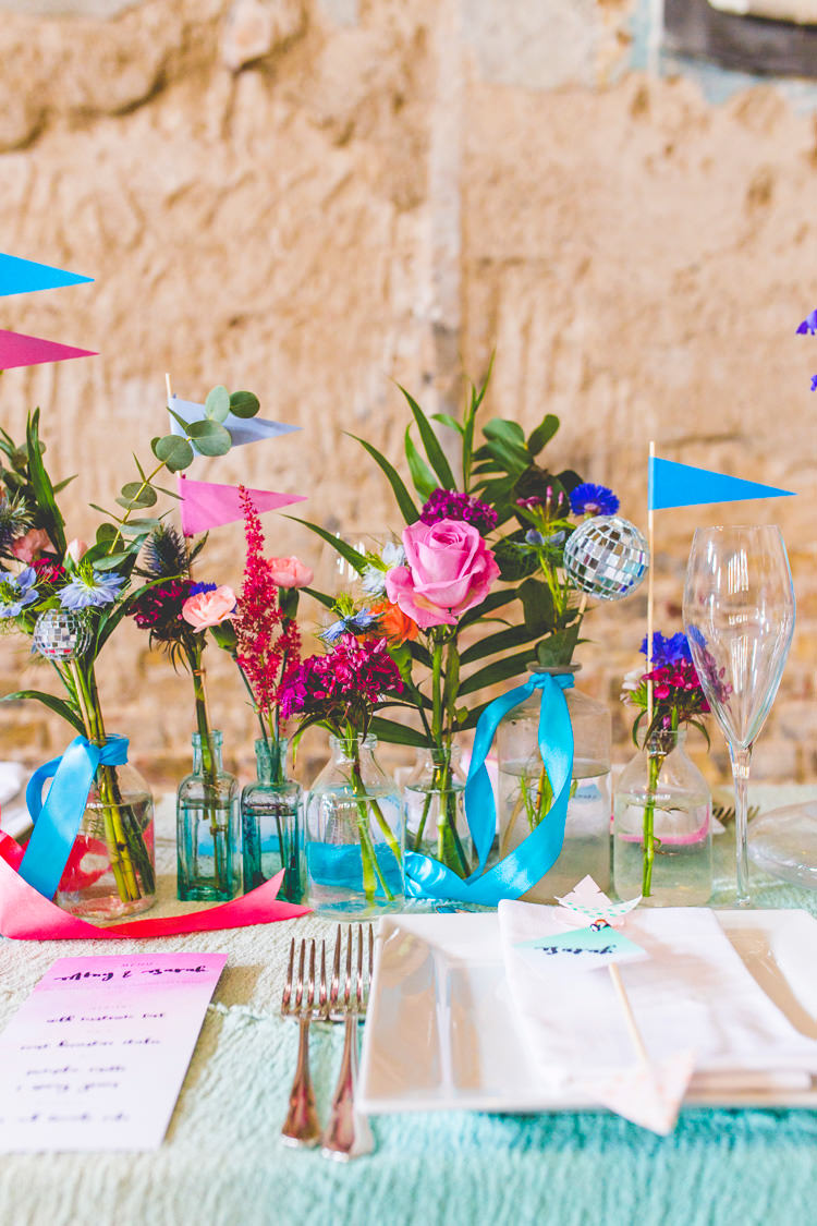 Flowers Bottles Flags Ribbon Centrepiece Watercolour Decor Colourful Alternative Same Sex Wedding Ideas http://www.els-photography.com/