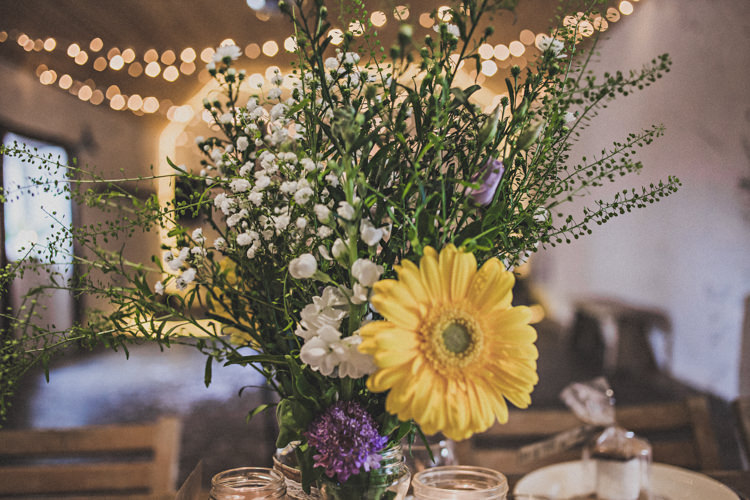 Jar Flowers Pretty DIY Farm Wedding http://www.johnelphinstonestirling.com/