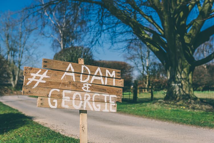 Rustic Wooden Sign Post Eclectic Colour Pop Barn Wedding http://www.robtarren.co.uk/