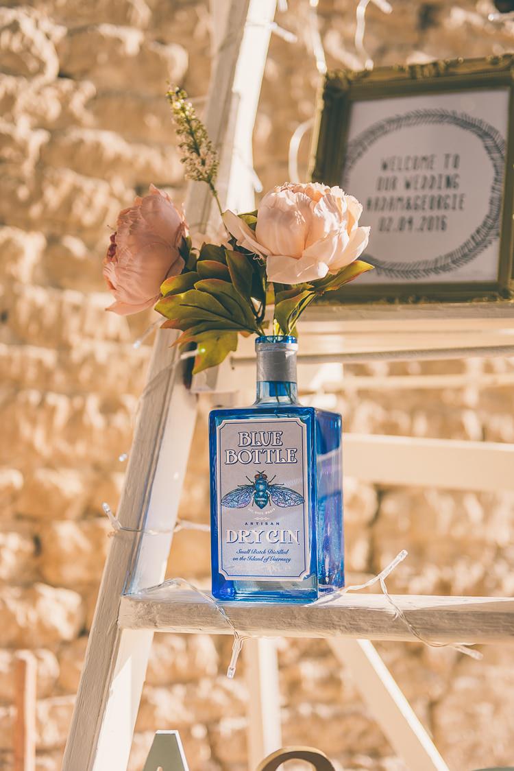 Ladder Decor Flowers Gin Bottle Eclectic Colour Pop Barn Wedding http://www.robtarren.co.uk/